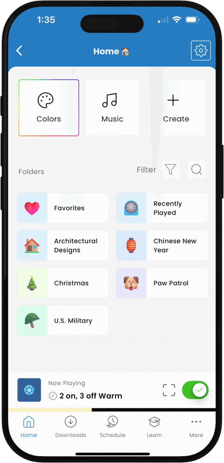 Spectrum Lighting iOS app home screen screenshot on iPhone showing Colors, Music, and Create tabs, Folders section, Favorites with Architectural and Christmas designs, Recently Played including Chinese New Year, Paw Patrol, and U.S. Military themes, and Now Playing 3 Warm filter effect with play controls for smart LED lighting control.